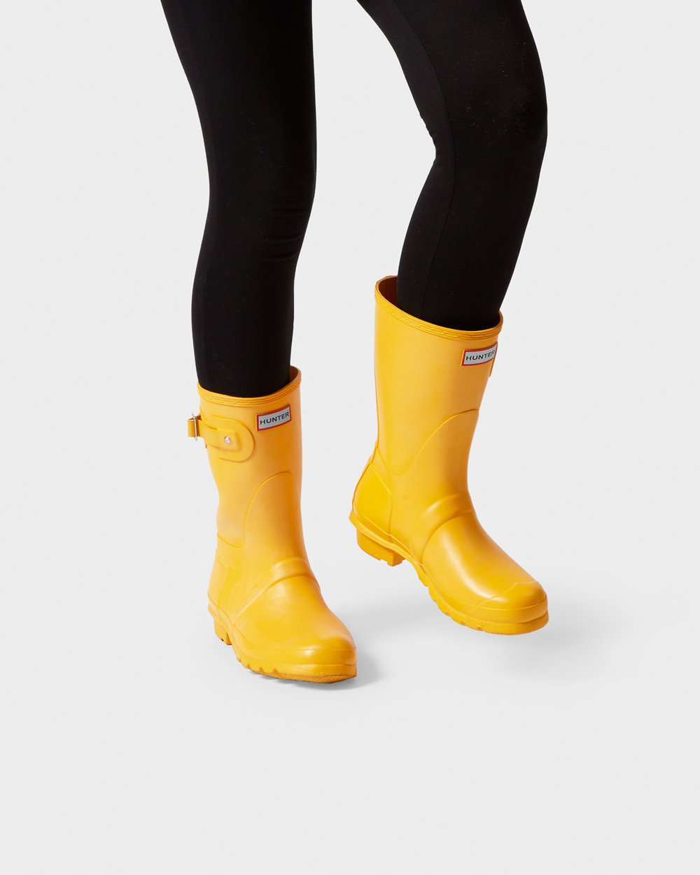 yellow rubber rain boots